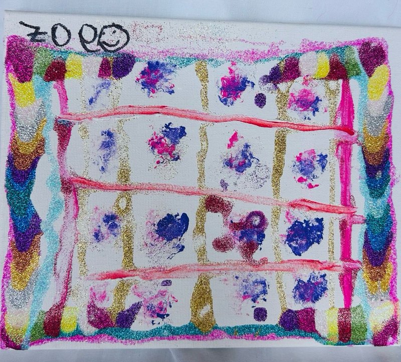 Glittery abstract painting on canvas: a gold grid over a white ground, filled with pink and blue paint blooms and neon pink lines, inside a rainbow glitter border, signed Zoe
